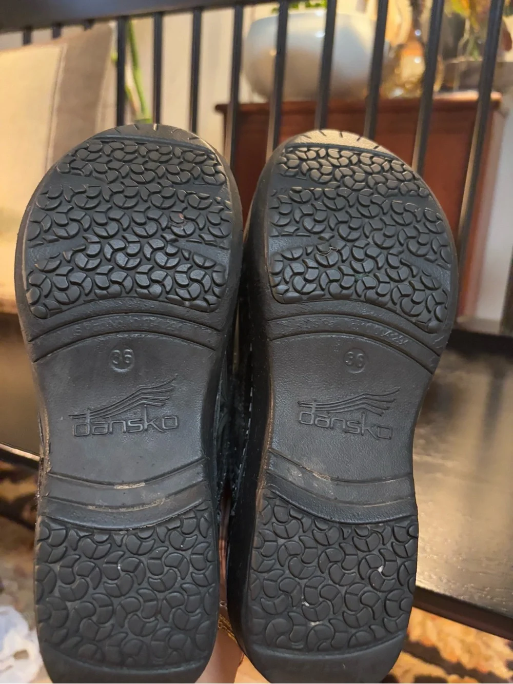 Dansko Black Clogs with Silver Floral Print